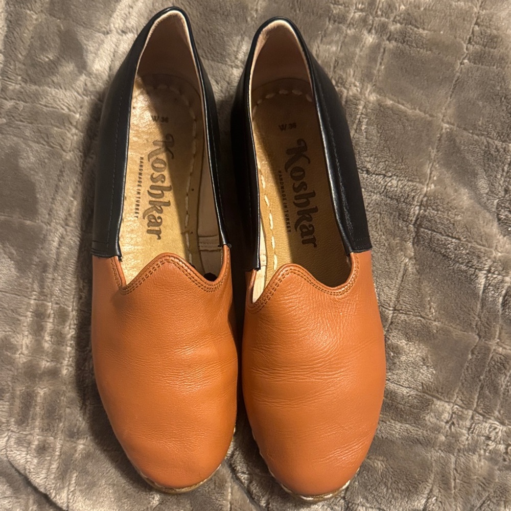 Koshkar Orange and Black Slip-On Shoes